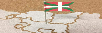 bandera de euskadi sobre mapa de euskadi